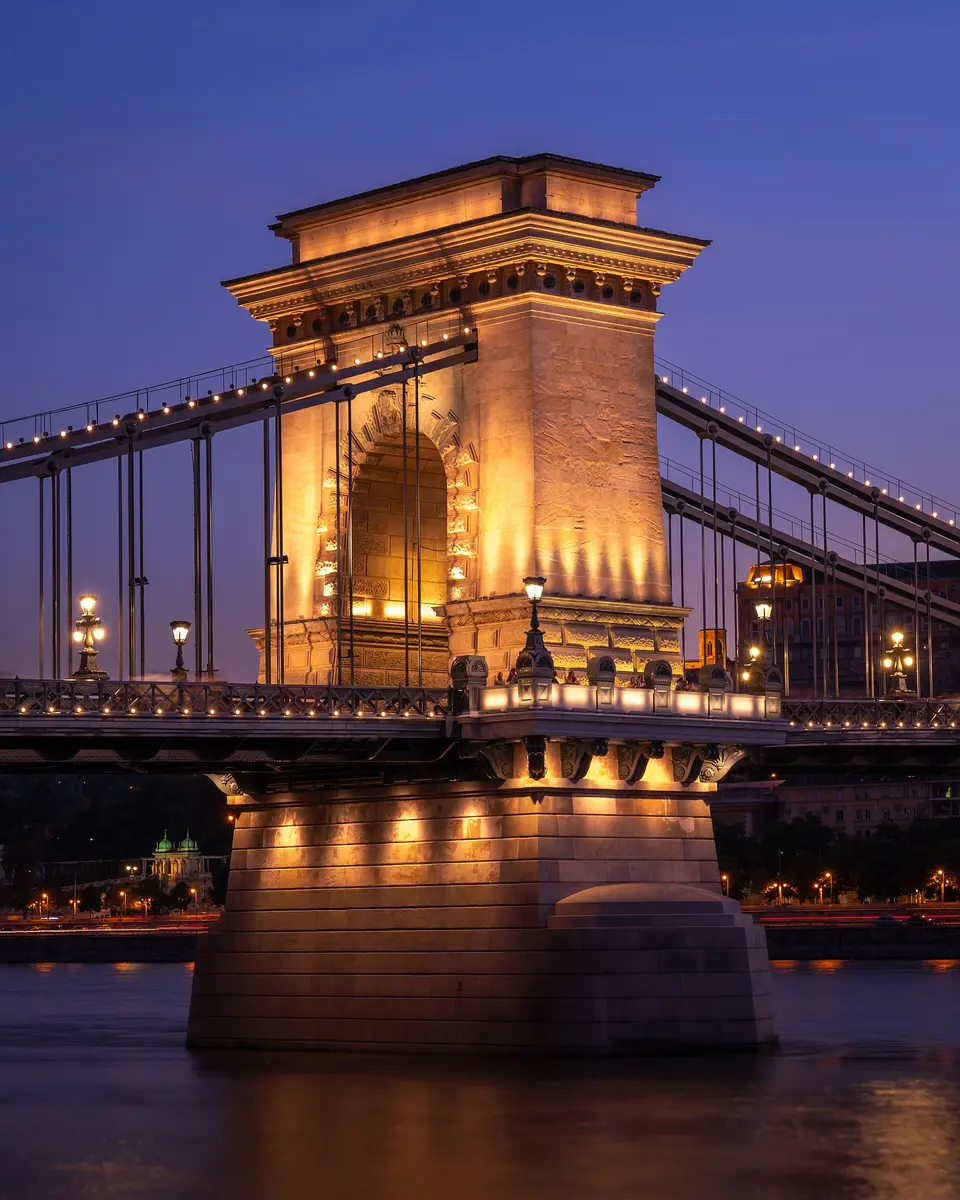 Sightseeing boat on the Danube passing the Hungarian Parliament and Chain Bridge in Budapest
