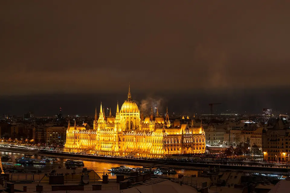 Autumn evening on the Danube with the illuminated Chain Bridge and Buda Castle from a cruise deck