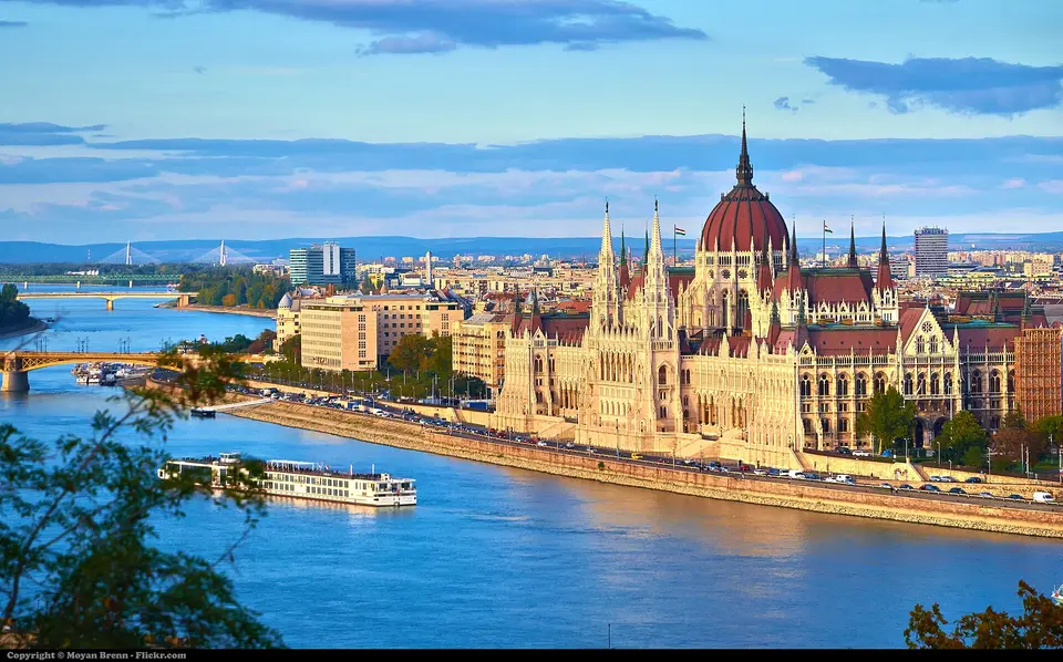 Golden sunset light over Buda Castle seen from a cruise boat on the Danube